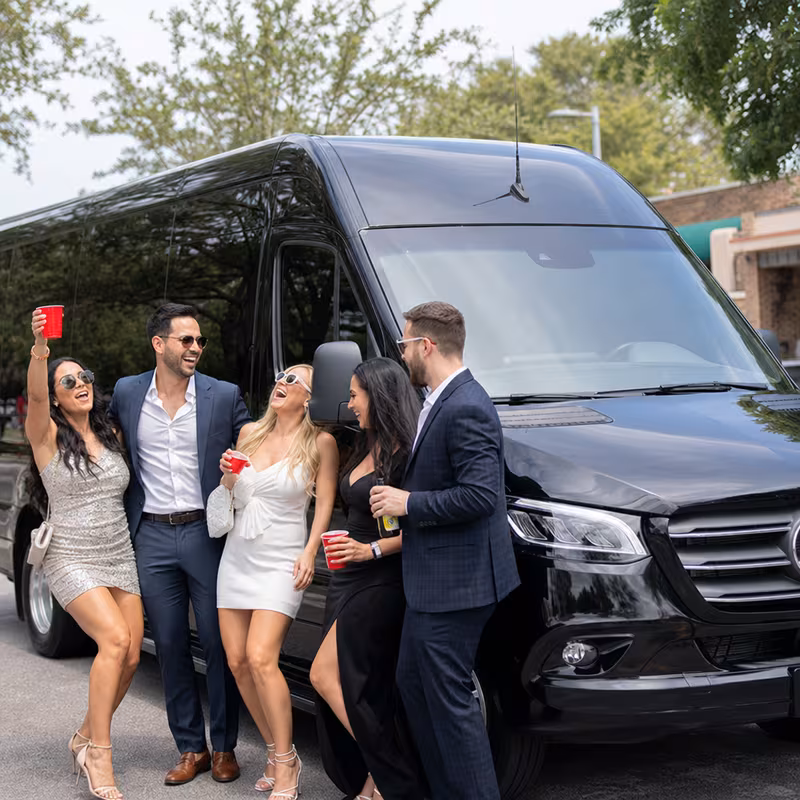 Group boarding a white charter bus for Bachelor & Bachelorette Transportation transportation in Parkland