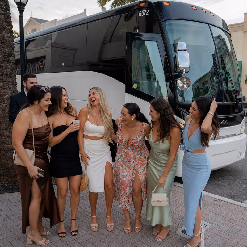Passengers loading luggage while boarding an Parkland group shuttle