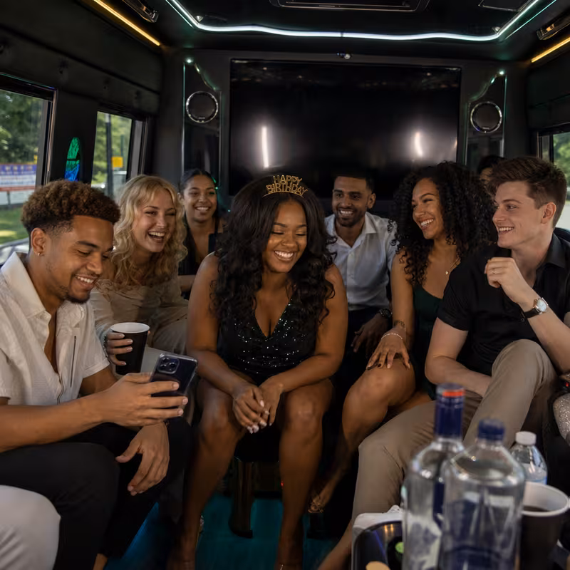 Black Mercedes Sprinter van staged for an Parkland Birthday Transportation group