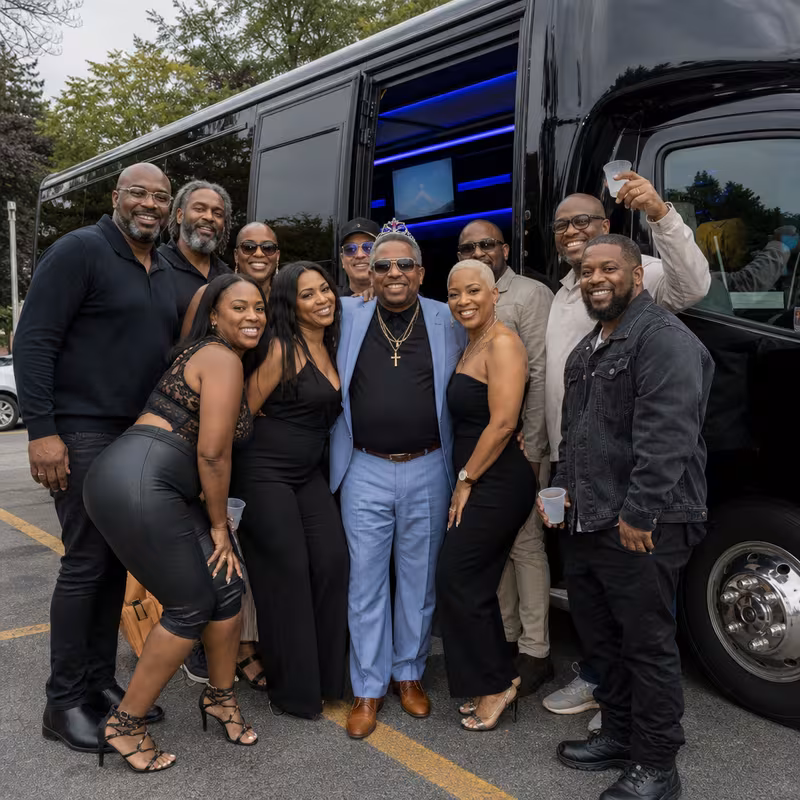 Party bus interior with wraparound leather seating and LED lighting in Parkland