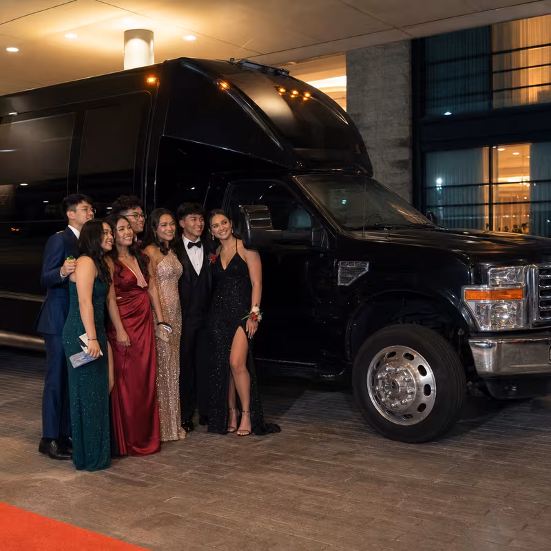 Party bus interior with wraparound leather seating and LED lighting in Parkland