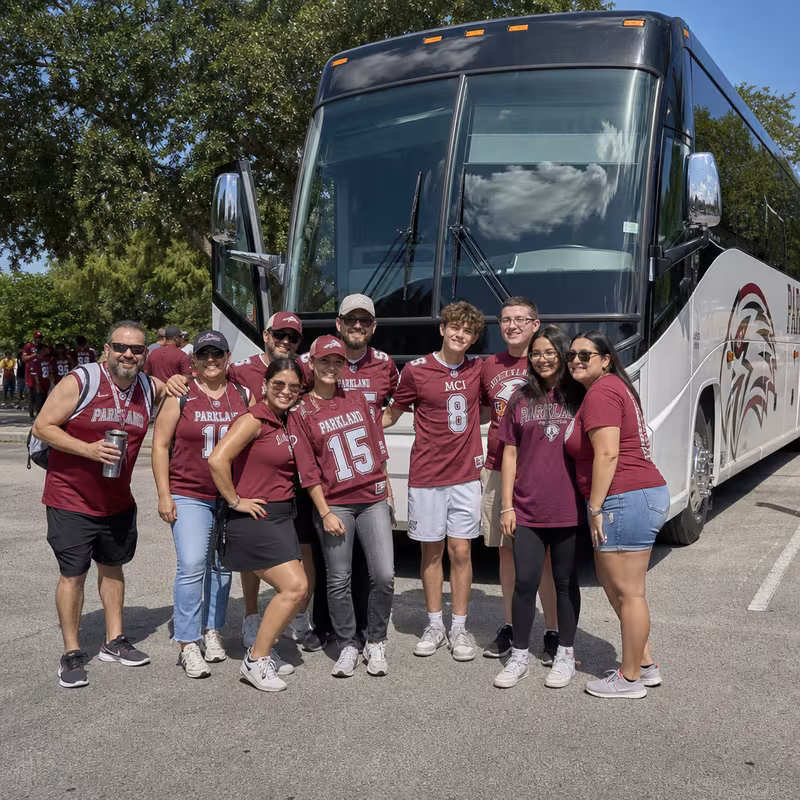 Passengers loading luggage while boarding an Parkland group shuttle
