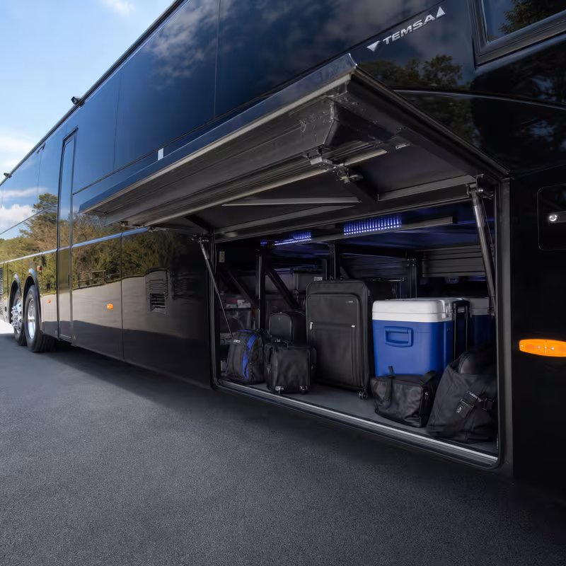 Party bus interior with wraparound leather seating and LED lighting in Parkland