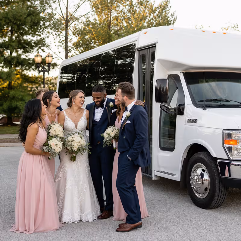 Passengers loading luggage while boarding an Parkland group shuttle